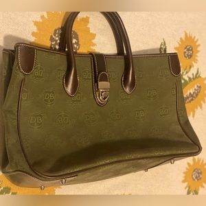 Dooney & Bourke pocket book- genuine- brand new condition.